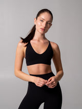Thumbnail 1 of Girlfriend Reversible Sports Bra - Onyx Black and White, 1 of 10