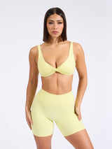 Thumbnail 1 of Twisted Sports Bra - Afterglow Yellow, 1 of 6